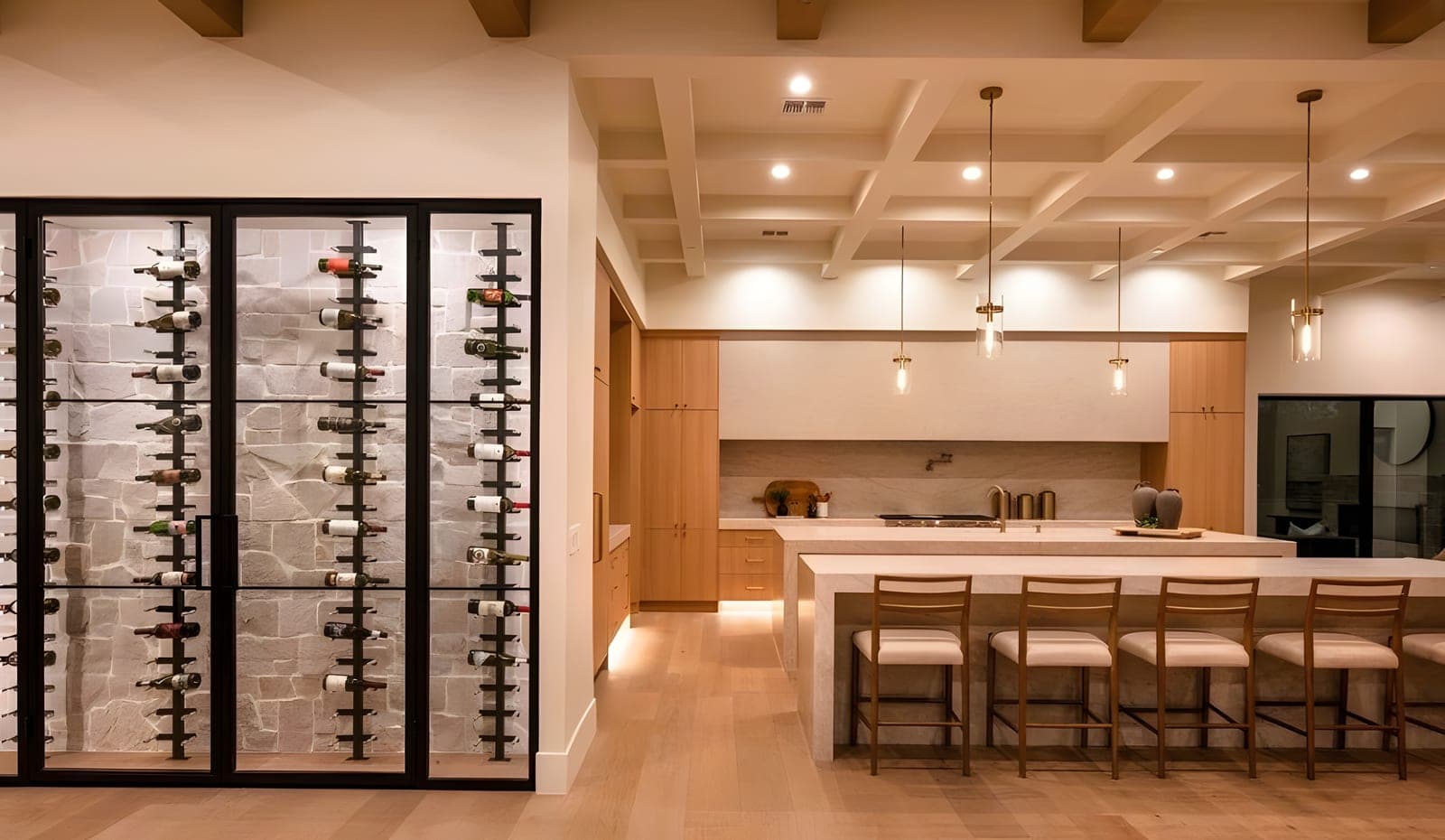 Kitchen with iron-framed glass wine display wall, stone accent wall, white oak cabinetry, and a coffered ceiling with exposed wood beams
